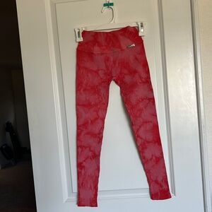 Pink bombshell sports leggings in like new condition